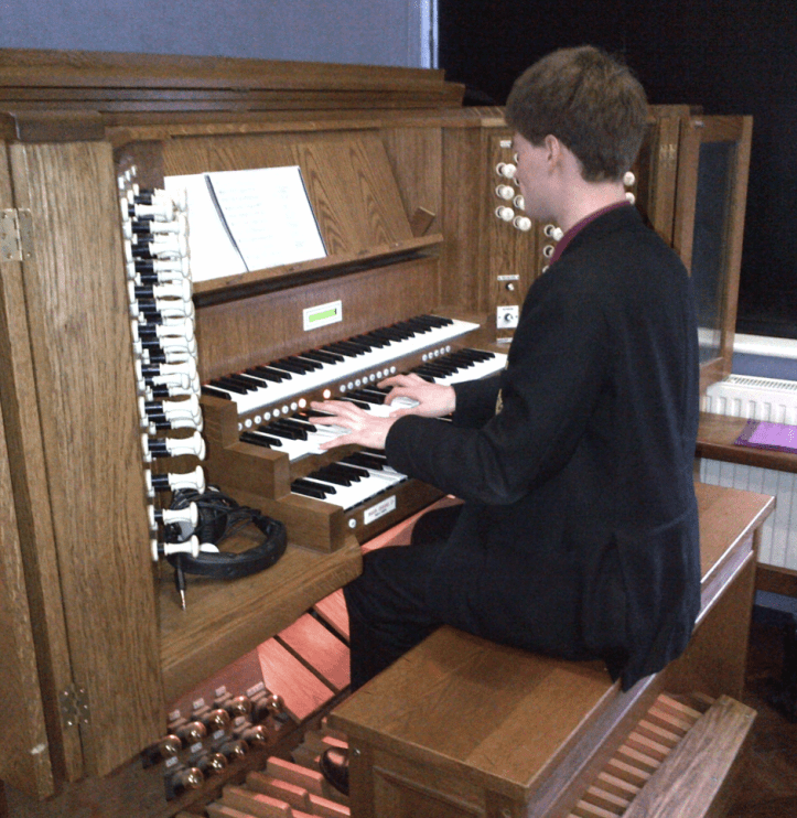Ben plays the organ for our Friday hymns. 