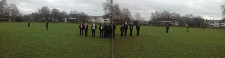 2p coin is the Sun. Students stand on the planets, dots on bits of paper.